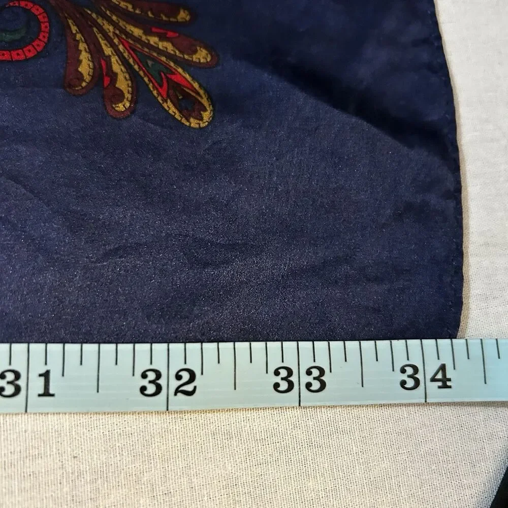VTG Express silk scarf featuring a red and blue paisley pattern
